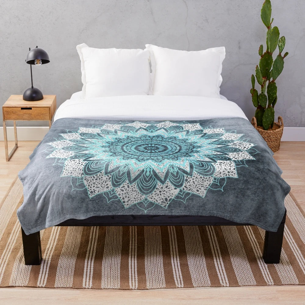 Soft and cozy boho mandala plush blanket in shades of blue and white
