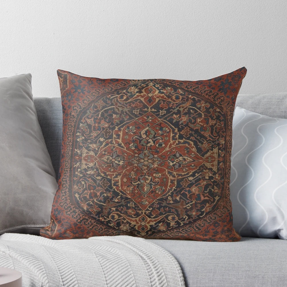 Boho chic vintage style medallion rug pattern decorative accent pillow in red, blue, green, and brown colors.