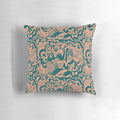 Whimsical doodle pattern pillow in teal, green, and tan colors for a boho-inspired home