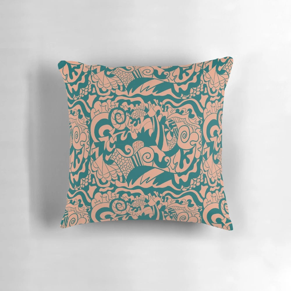 Whimsical doodle pattern pillow in teal, green, and tan colors for a boho-inspired home
