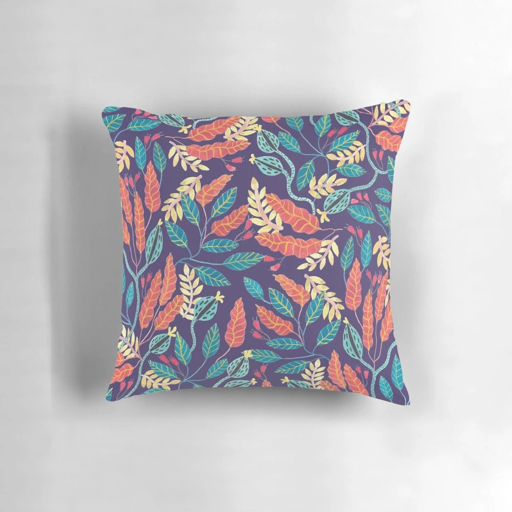 Indigo and burnt sienna floral pattern pillow with a boho, tropical vibe