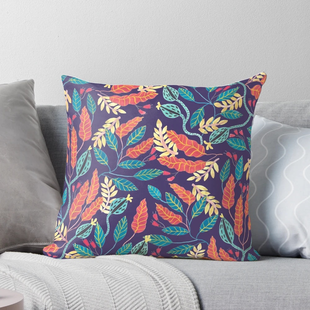 Indigo and burnt sienna floral pattern pillow with a boho, tropical vibe
