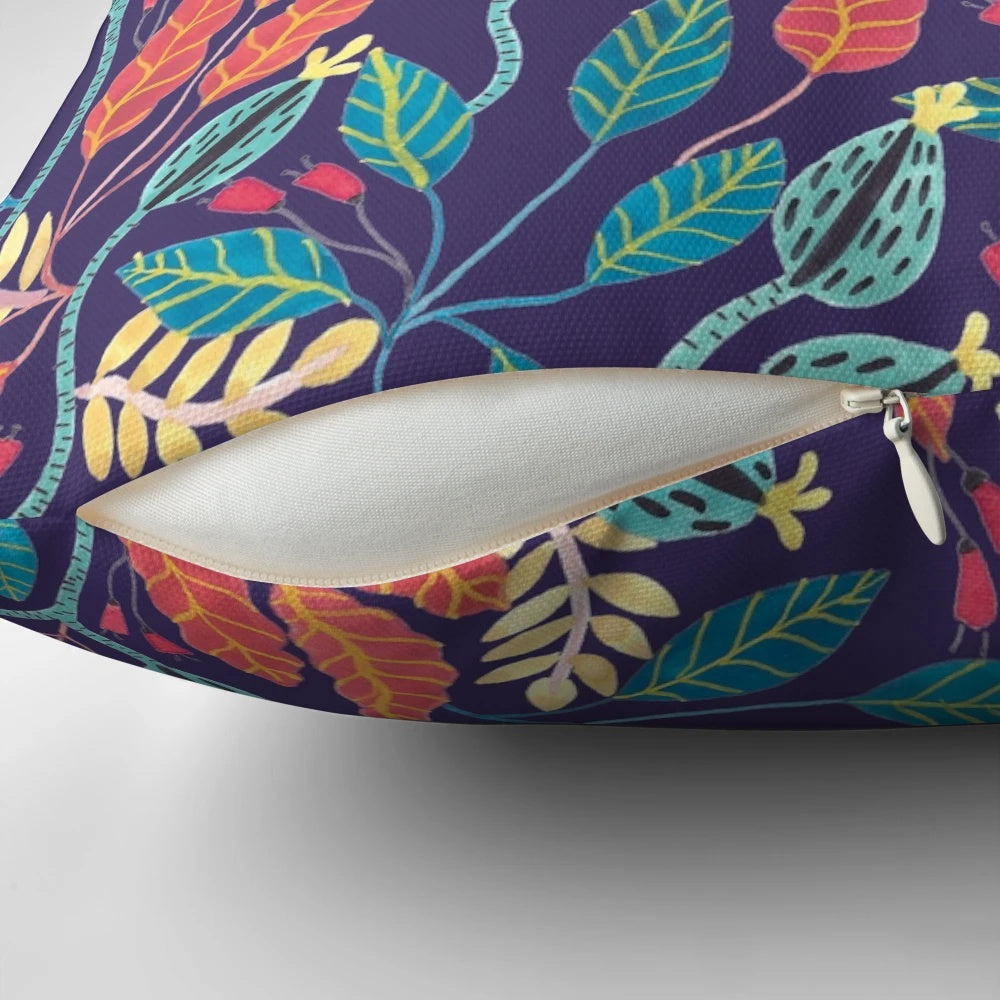 Indigo and burnt sienna floral pattern pillow with a boho, tropical vibe