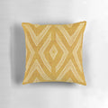 Boho geometric golden pillow with zig zag and diamond pattern