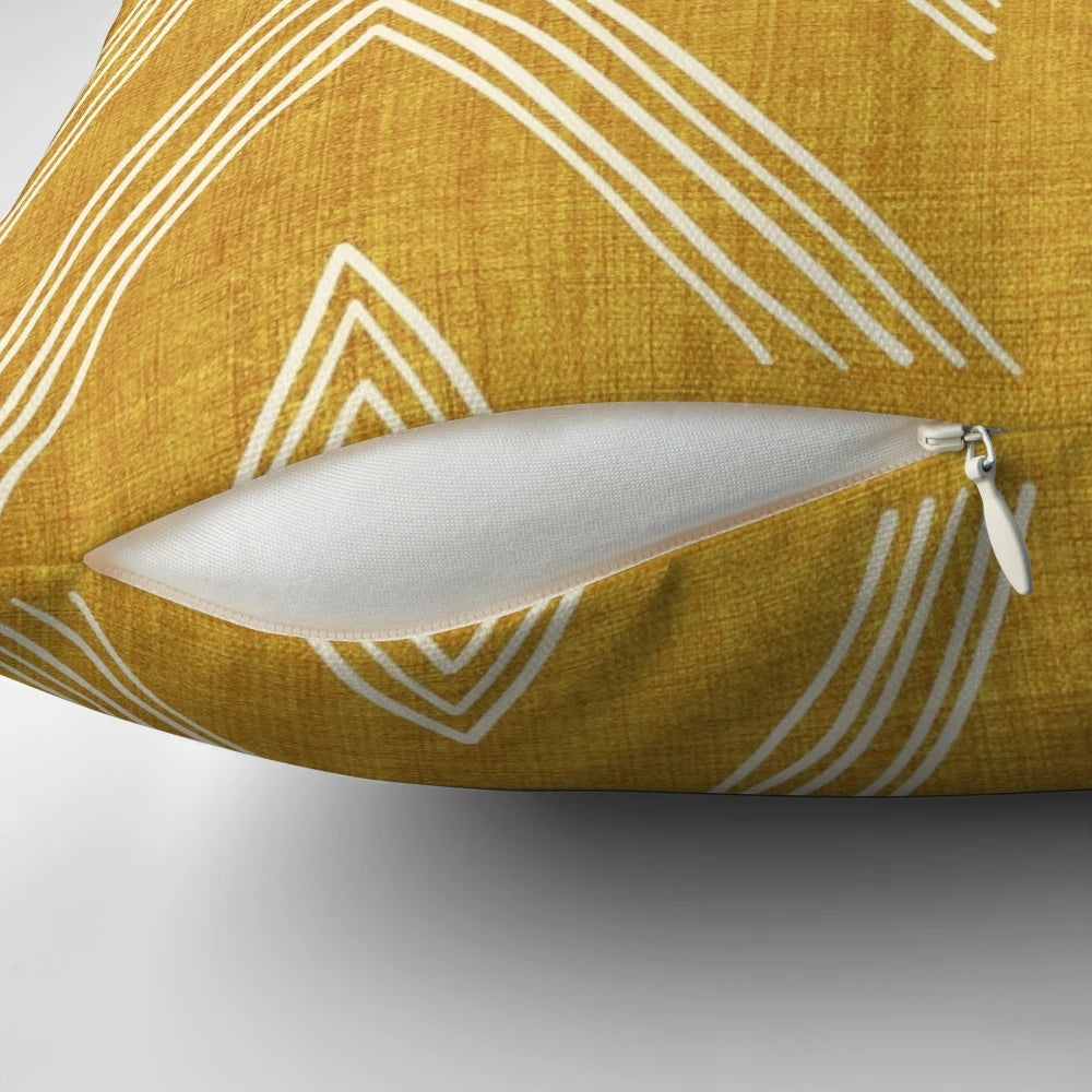 Boho geometric golden pillow with zig zag and diamond pattern
