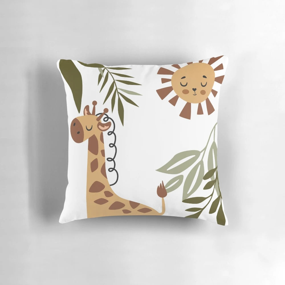Boho-style pillow featuring a cute giraffe surrounded by jungle leaves and the sun