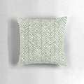 Boho herringbone pattern pillow in sage green and white colors