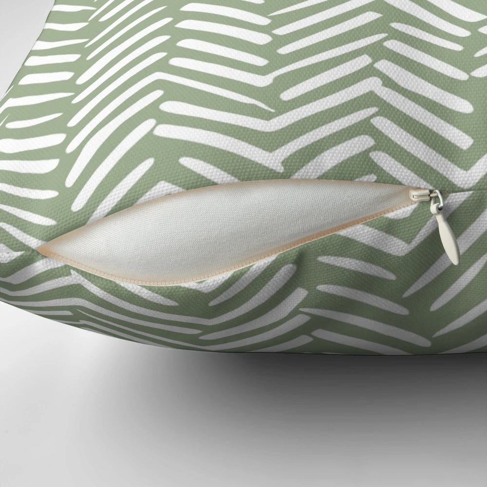Boho herringbone pattern pillow in sage green and white colors