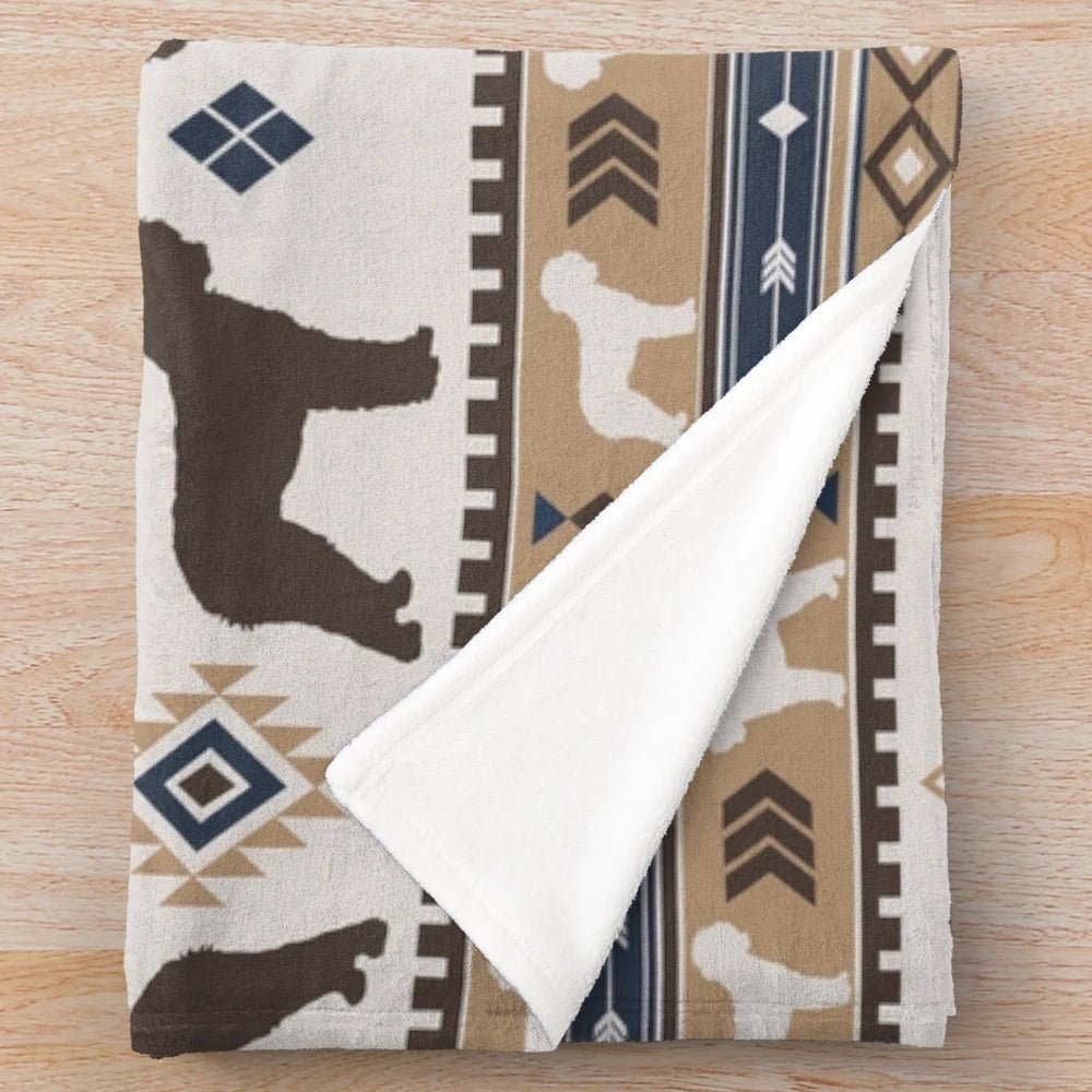 Tan Lagotto Romagnolo dog on a boho-style plush blanket