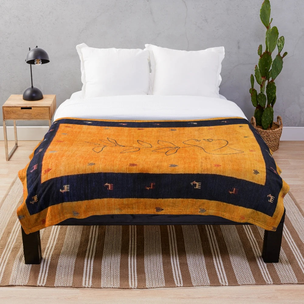 Moroccan-style plush blanket with traditional artwork and bohemian design