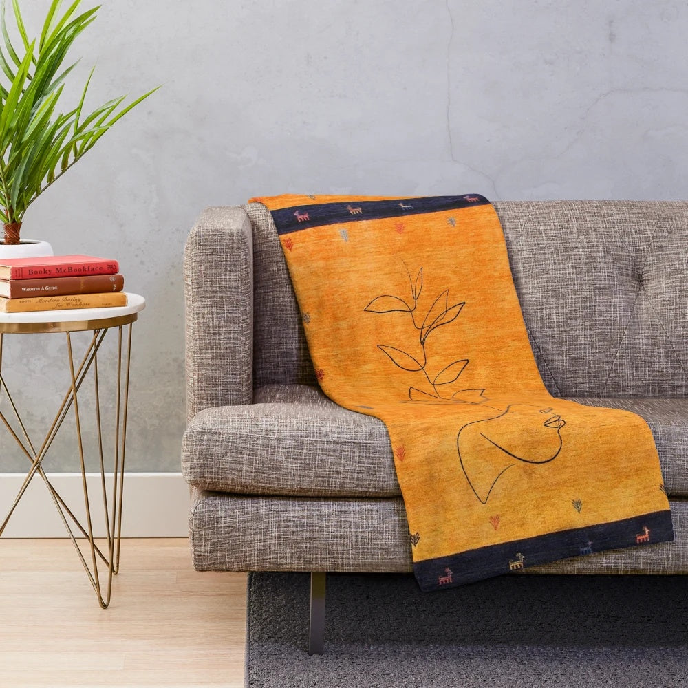 Moroccan-style plush blanket with traditional artwork and bohemian design