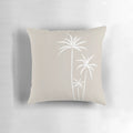 Boho palm trees throw pillow with sketch design in white and beige.