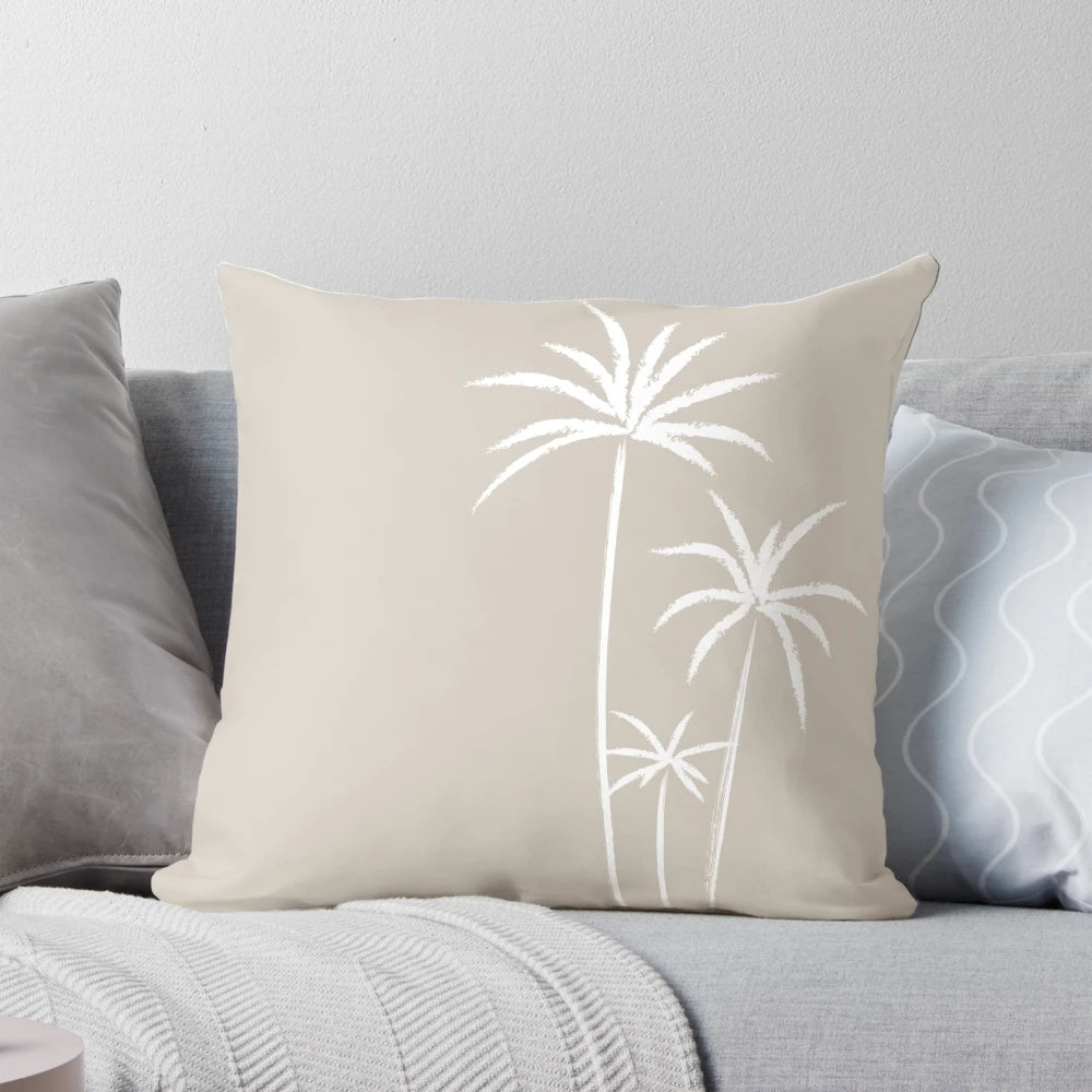 Boho palm trees throw pillow with sketch design in white and beige.