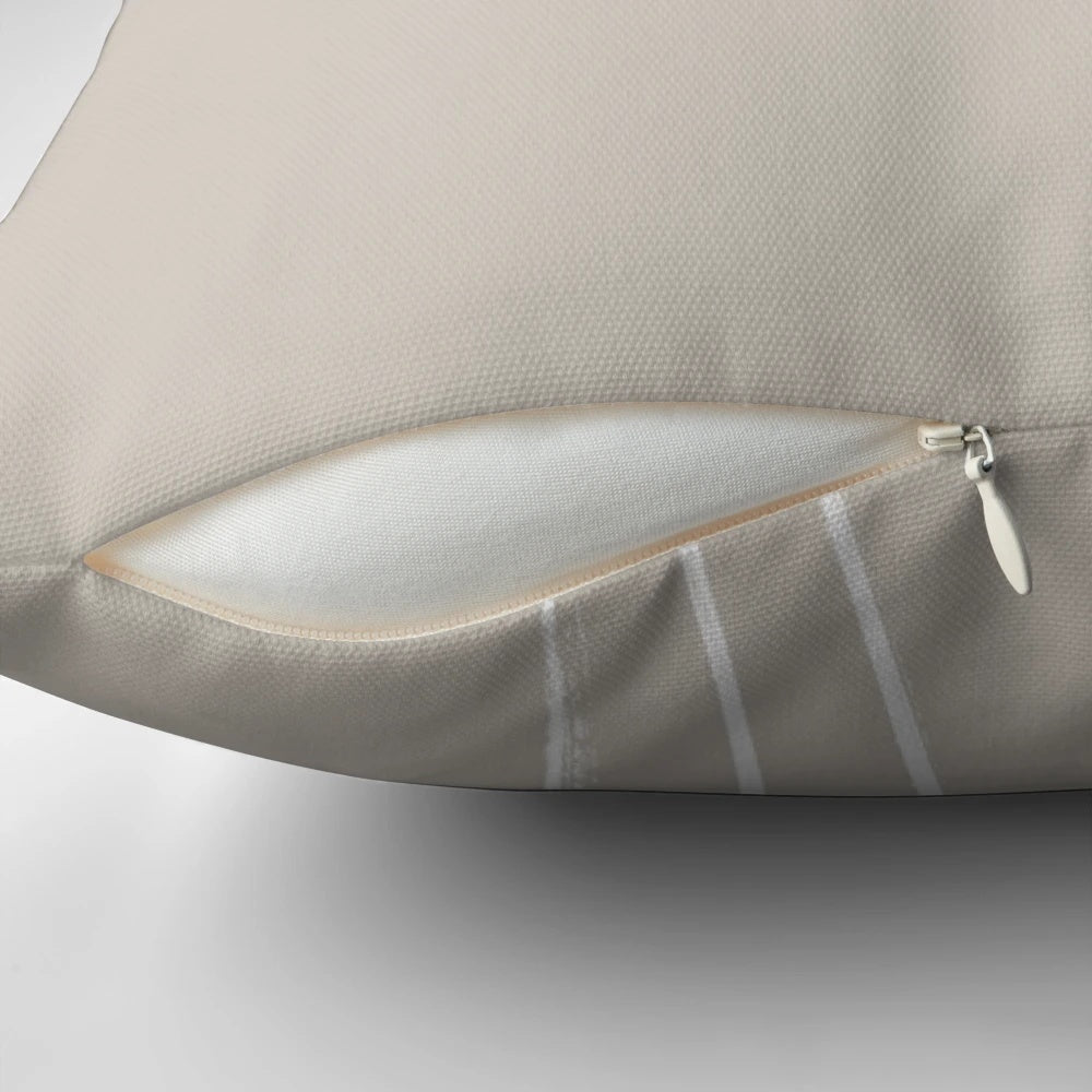 Boho palm trees throw pillow with sketch design in white and beige.