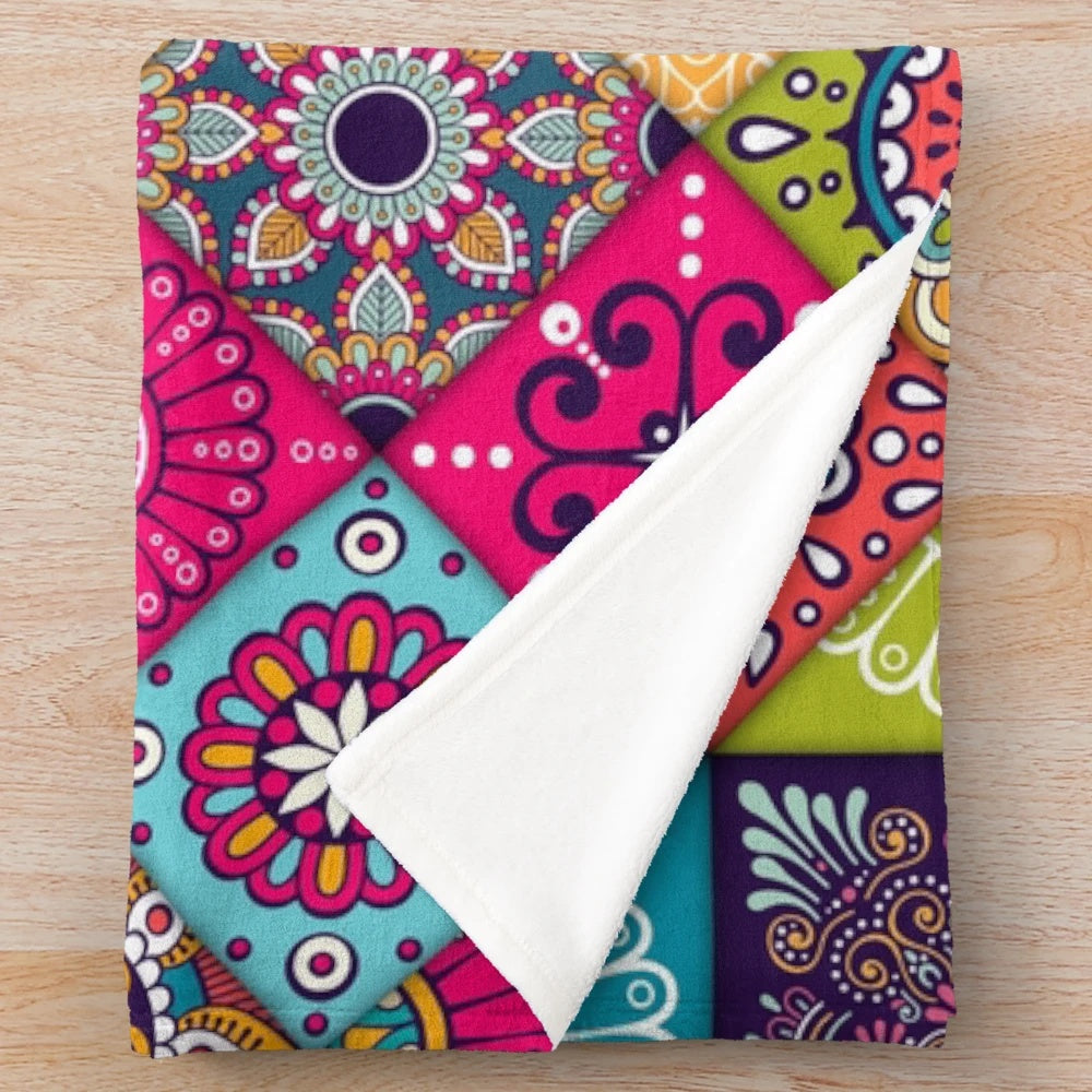 Colorful patchwork plush blanket with ethnic hippie patterns