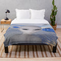 Boho plush blanket with alien and extraterrestrial patterns