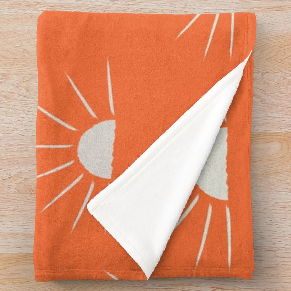 Boho sun pattern orange plush blanket with abstract sun silhouette design