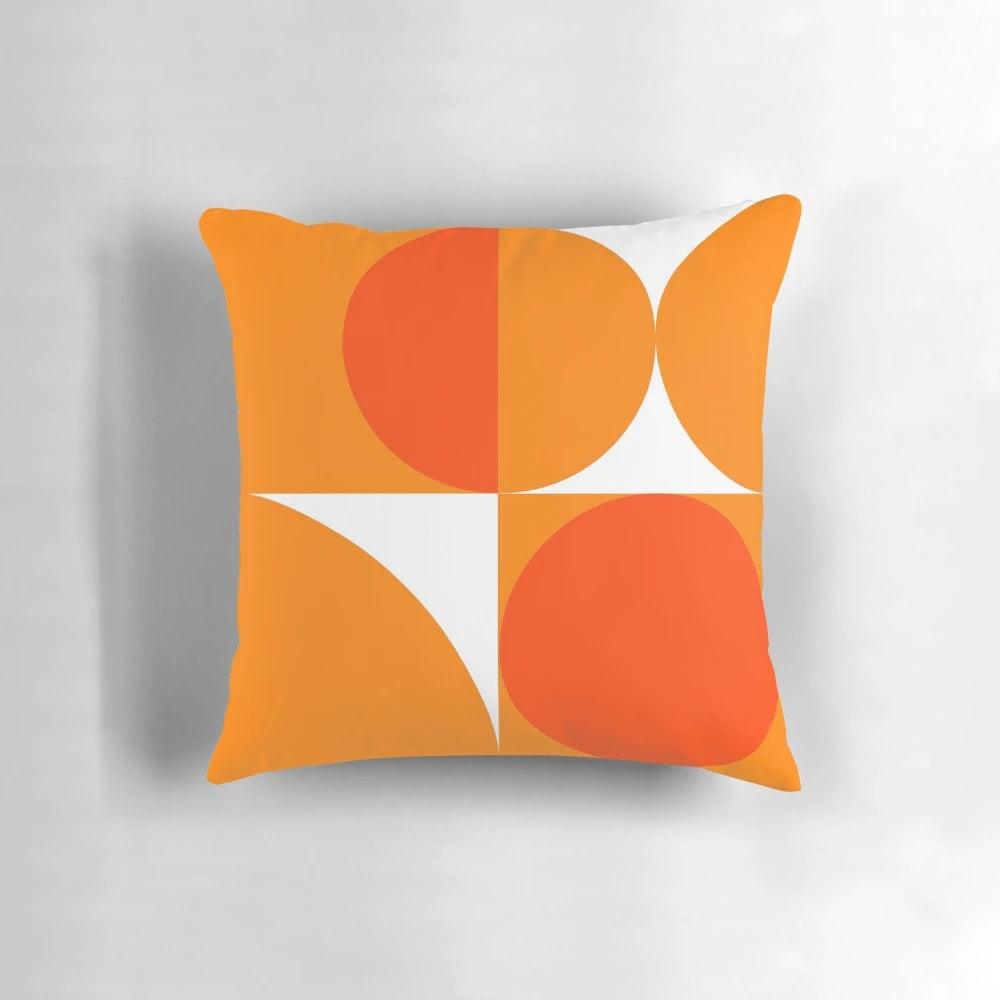 Orange and geometric pillow design inspired by the Bauhaus movement