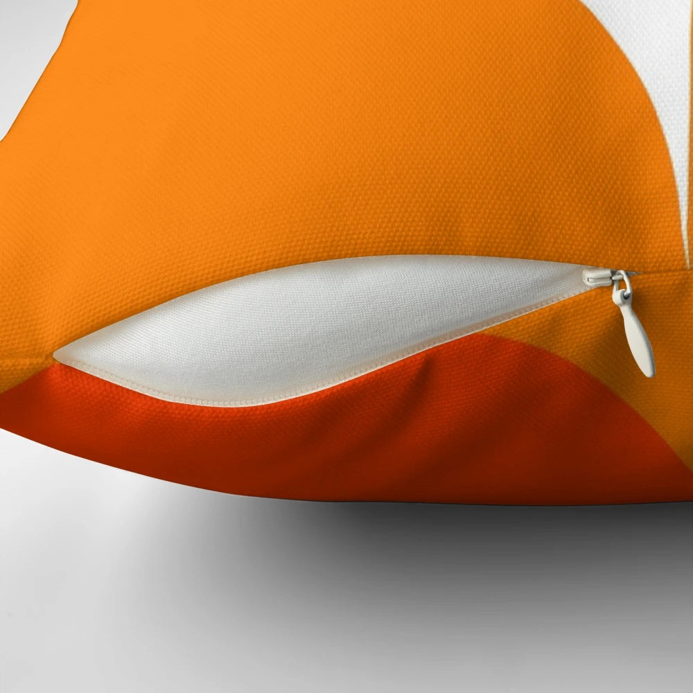 Orange and geometric pillow design inspired by the Bauhaus movement