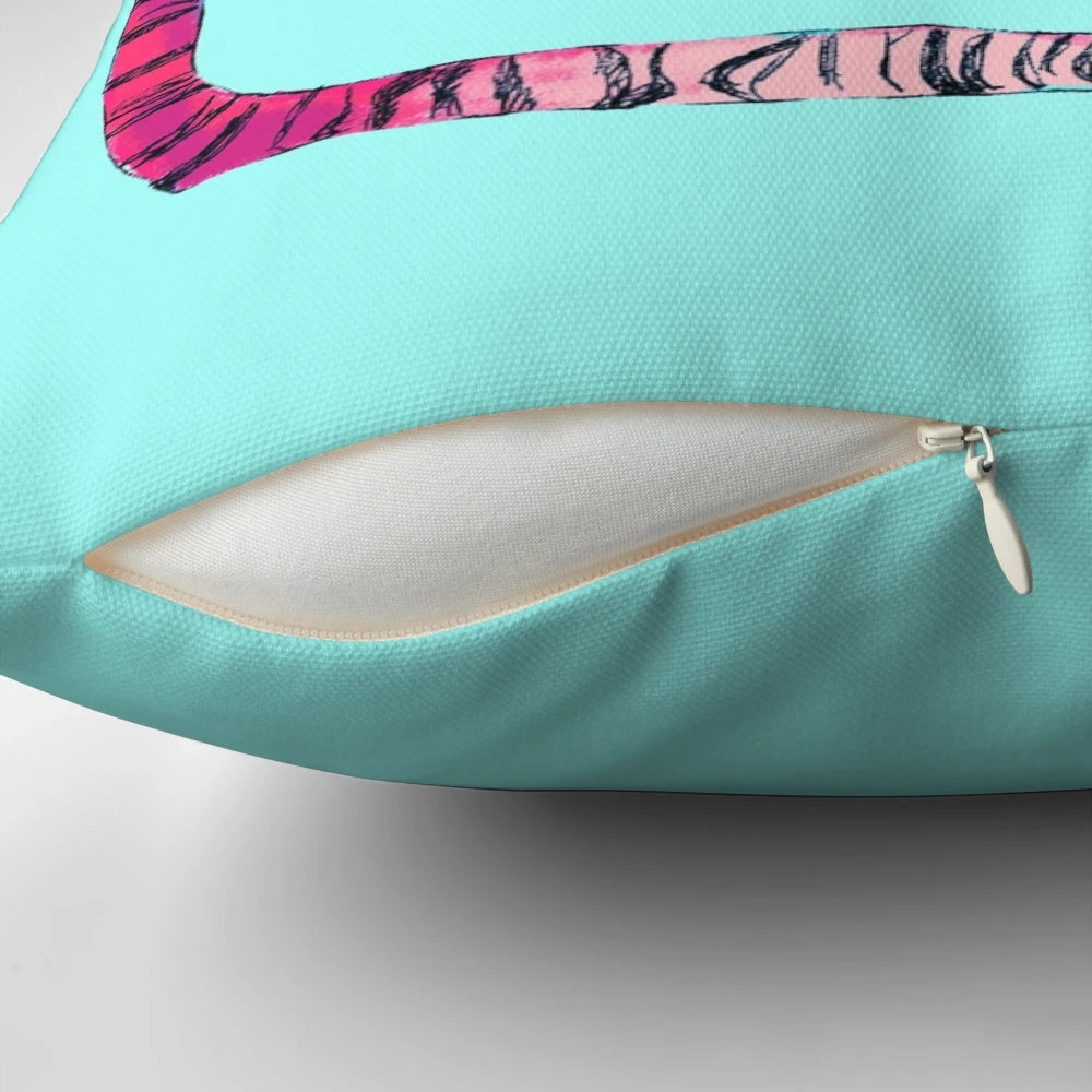 A colorful pillow featuring a bold tiger stripe print design
