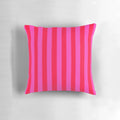 Bold and vibrant vertical striped pattern in pink and neon red decorative throw pillow