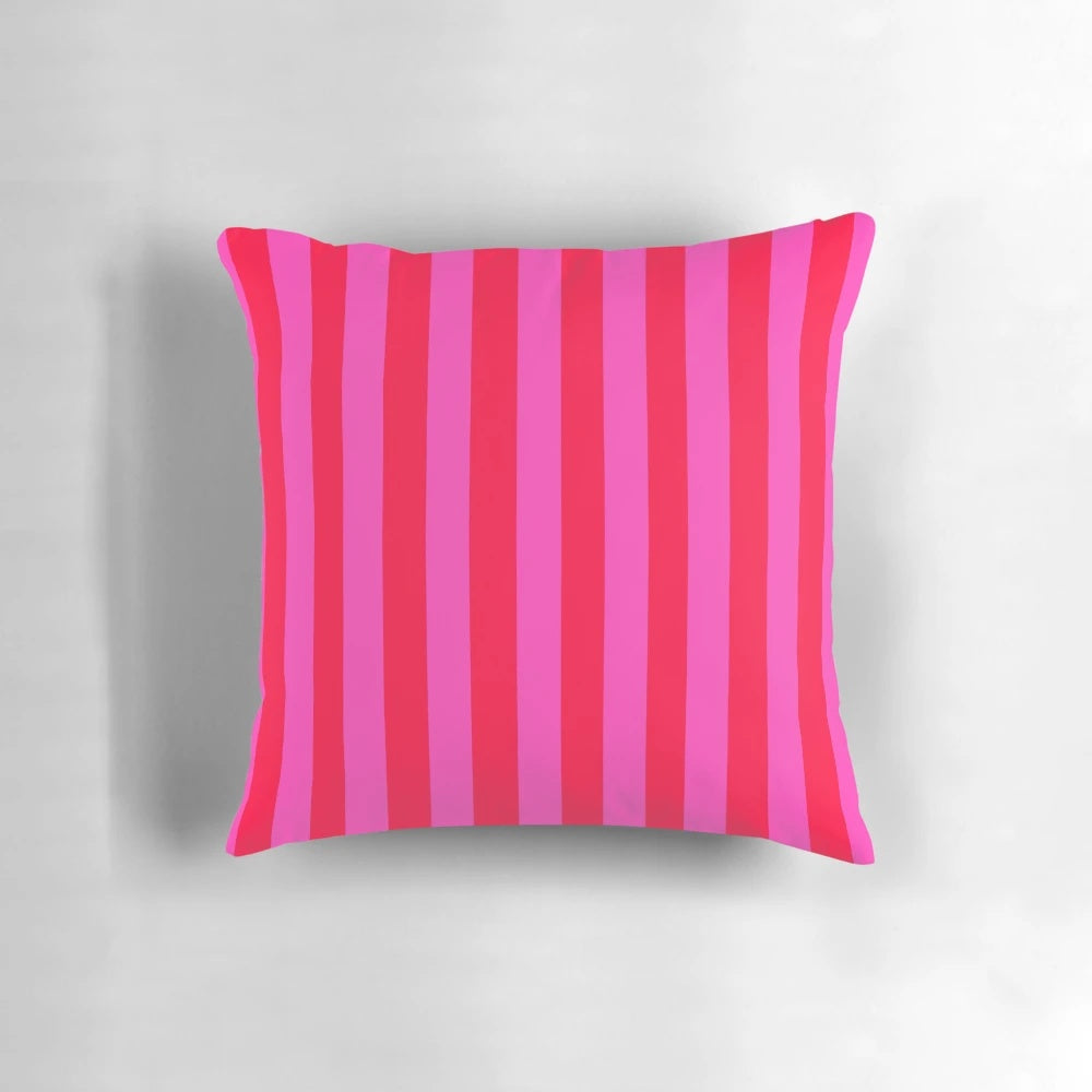 Bold and vibrant vertical striped pattern in pink and neon red decorative throw pillow