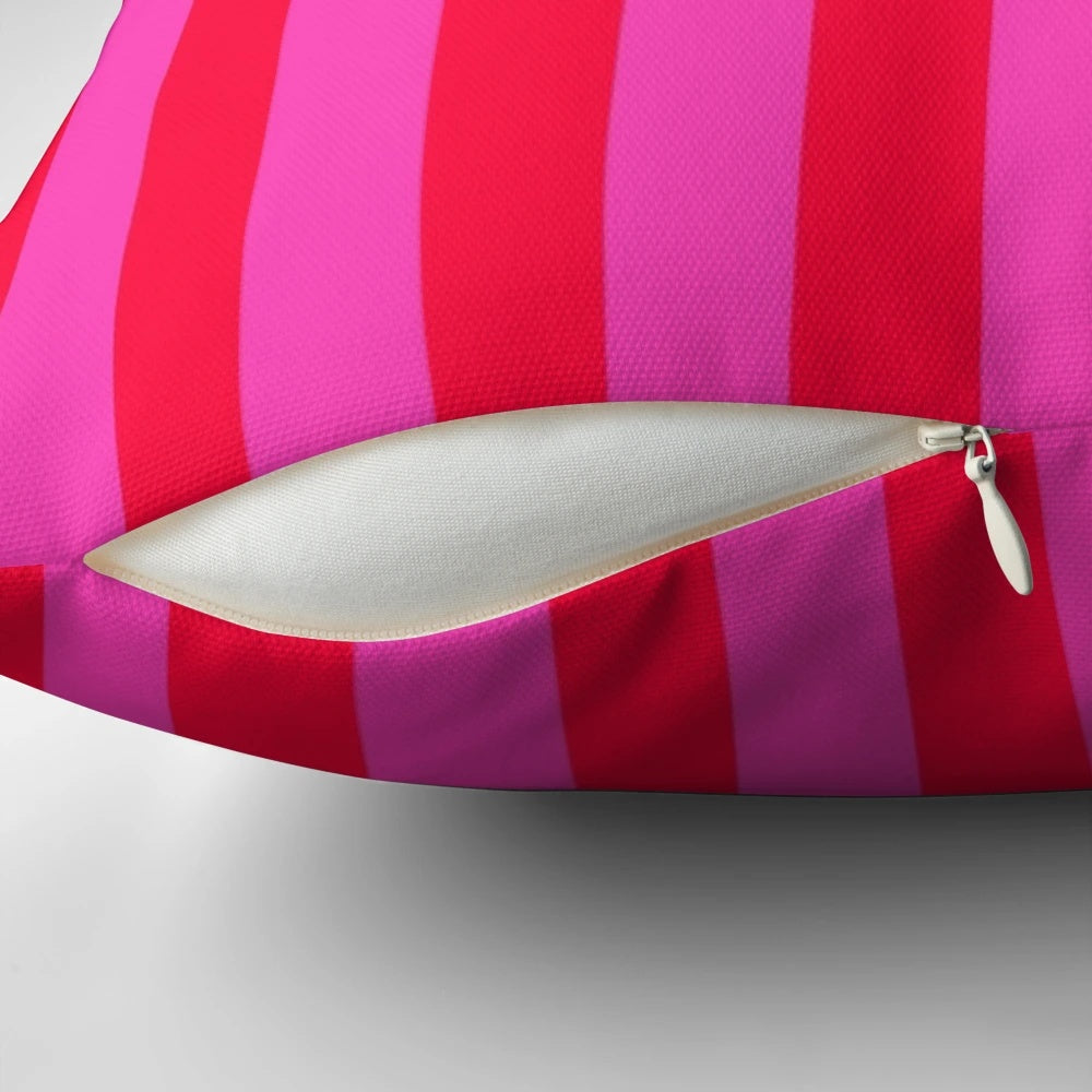 Bold and vibrant vertical striped pattern in pink and neon red decorative throw pillow