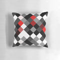 Bold black, white, and red diagonal patterned throw pillow for modern interior design