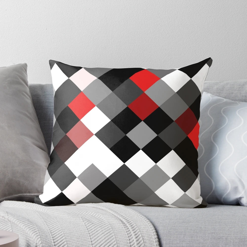 Bold black, white, and red diagonal patterned throw pillow for modern interior design