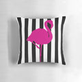 Vibrant hot pink flamingo on a black and white striped pillow, a bold and eye-catching graphic design.