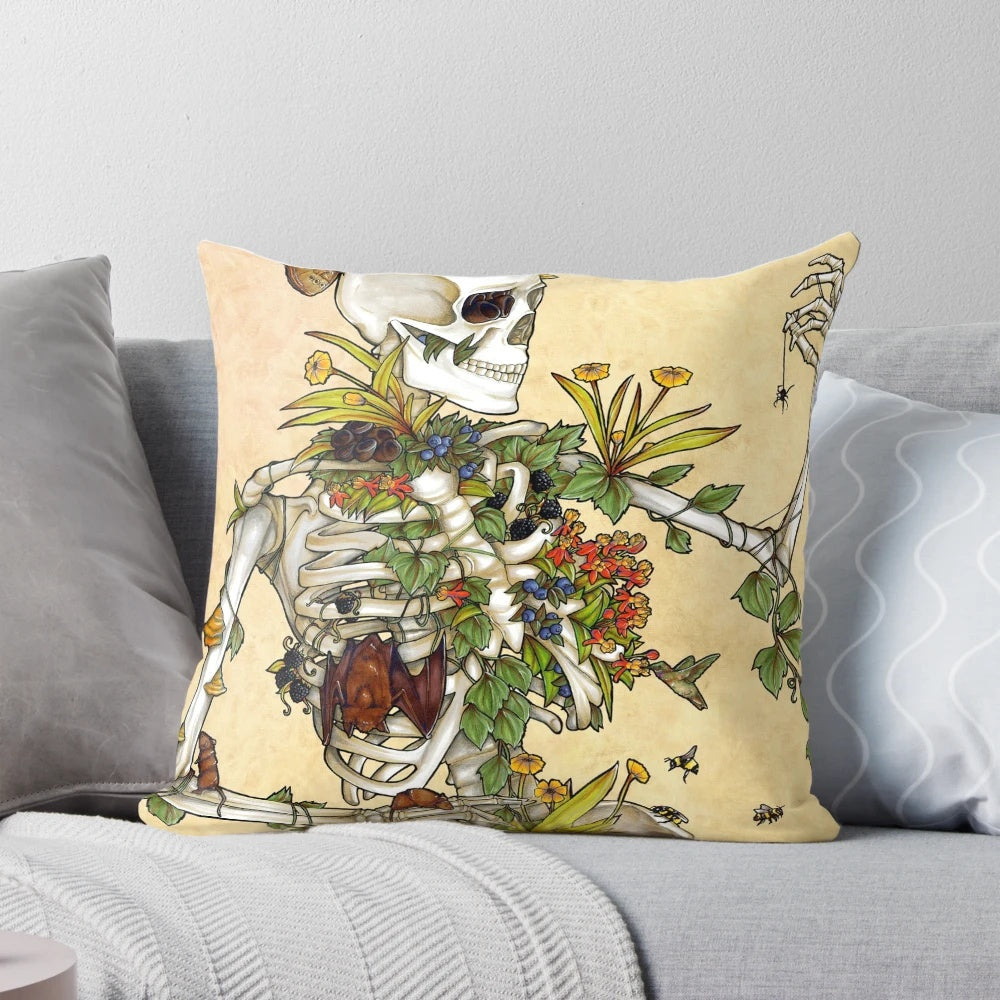 Decorative pillow featuring a detailed illustration of a human skull surrounded by botanical elements like plants, flowers, and fungi.