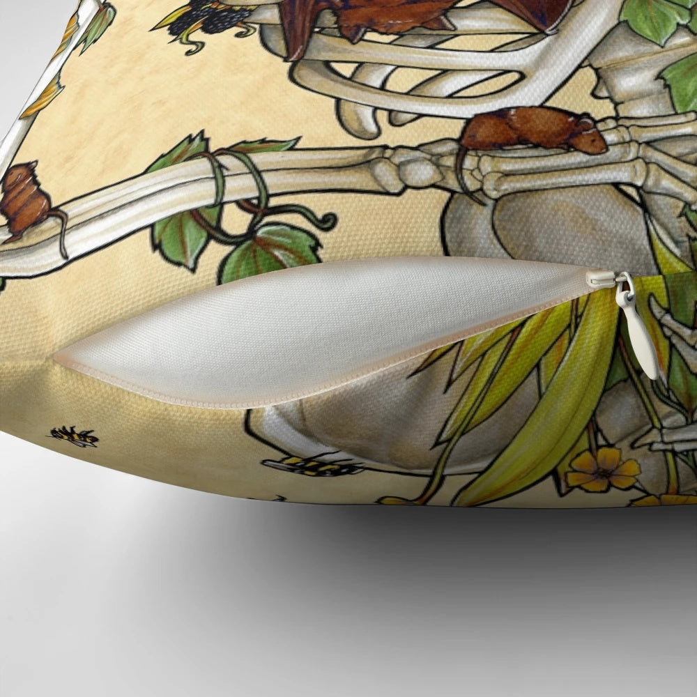Decorative pillow featuring a detailed illustration of a human skull surrounded by botanical elements like plants, flowers, and fungi.
