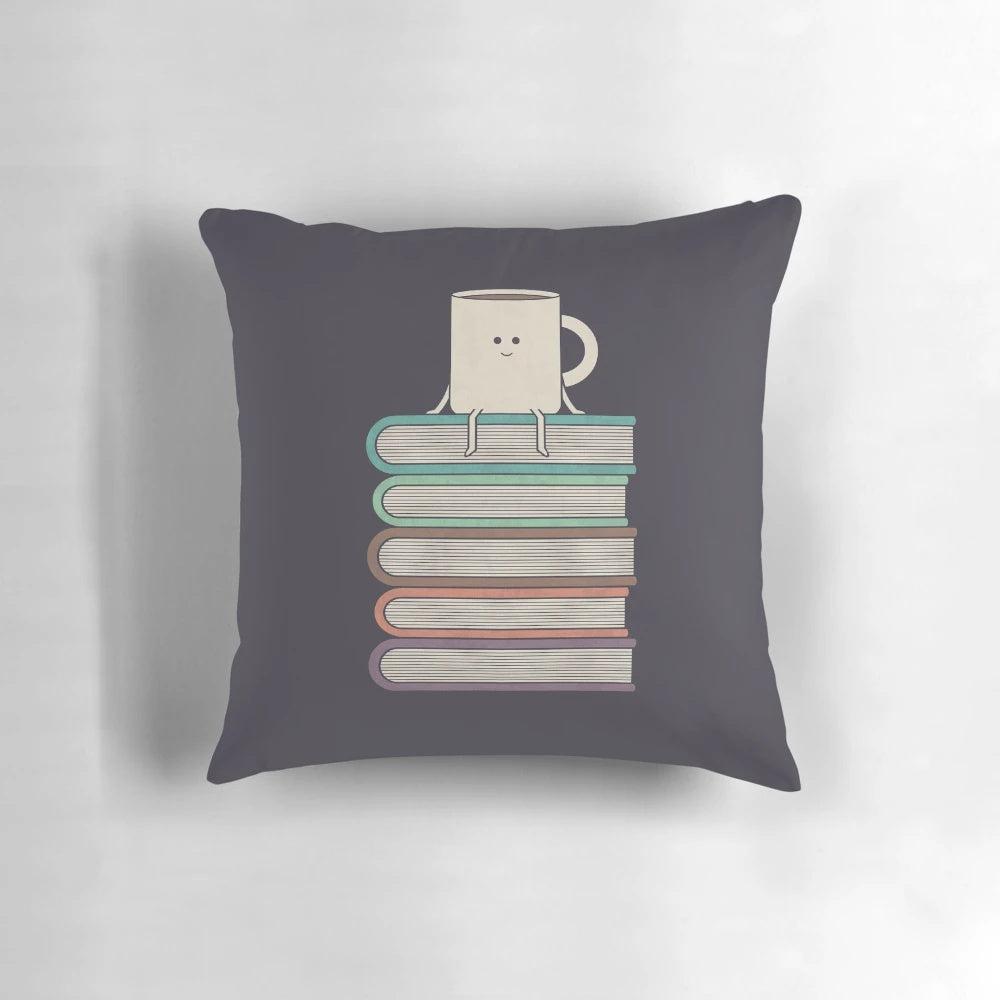 "Soft, plush pillow with a book-themed design, perfect for book lovers and readers"