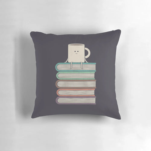 "Soft, plush pillow with a book-themed design, perfect for book lovers and readers"