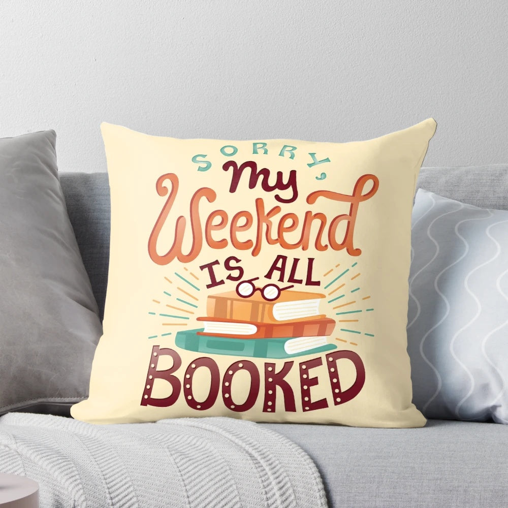 A cozy pillow featuring the text "I'm booked" in a hand-lettered style, perfect for book lovers and avid readers.