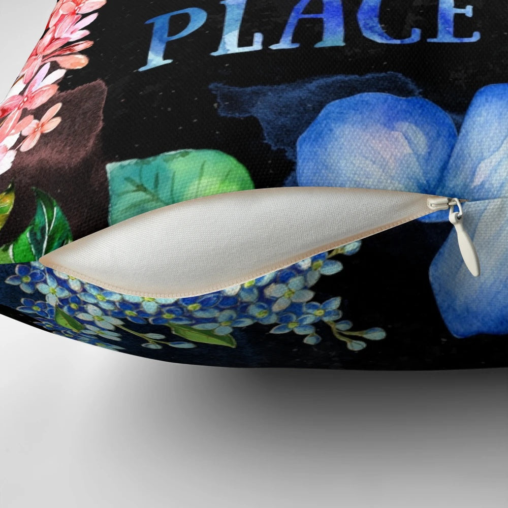 A black and multicolored watercolor floral pillow with a literary theme, perfect for book lovers and bibliophiles.