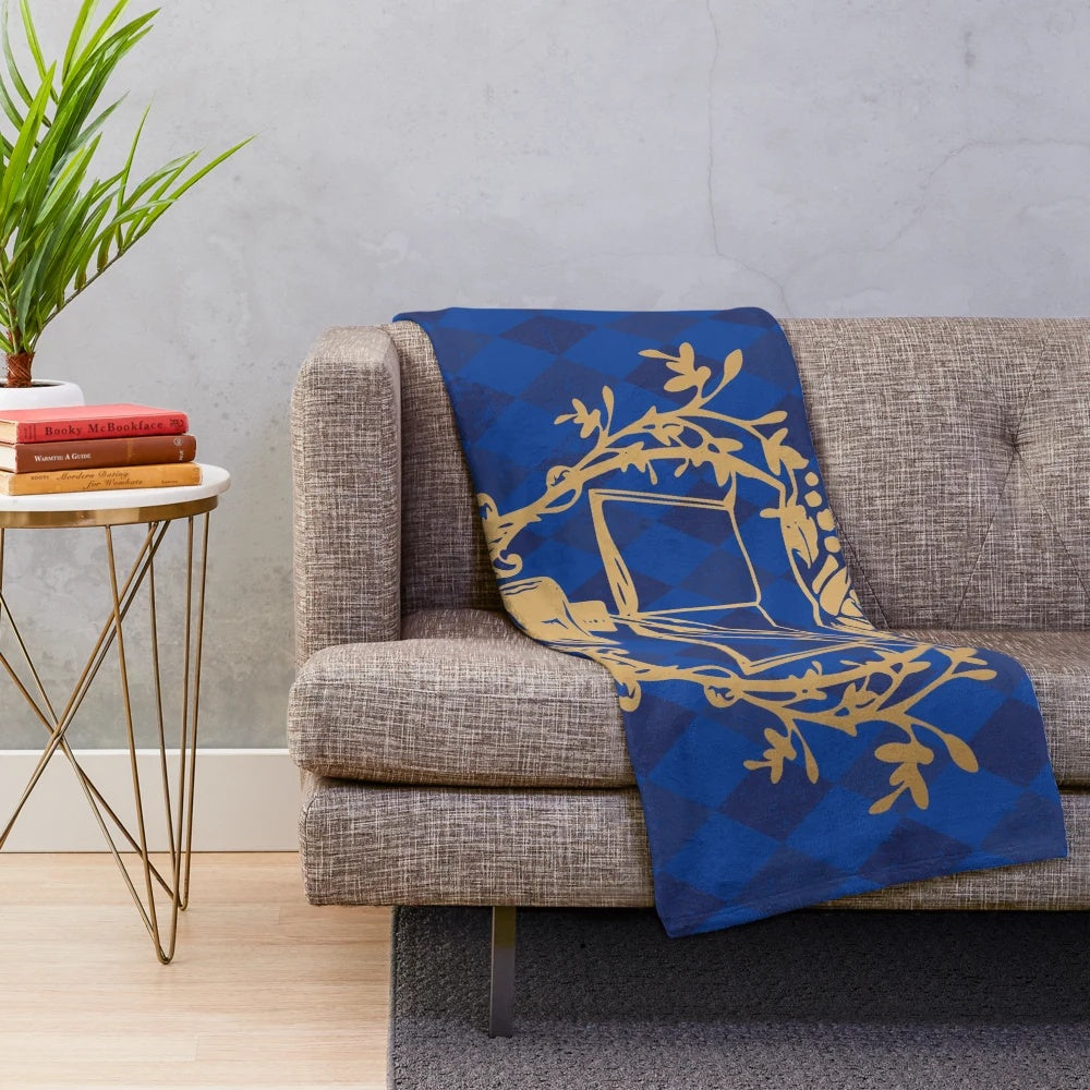 Plush blanket featuring Myne's crest from the anime Ascendance of a Bookworm