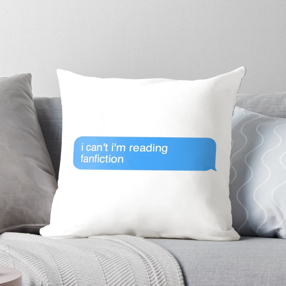A cozy, white pillow with the text "I can't, I read FanFiction" printed on it, perfect for book lovers and fanfiction enthusiasts.