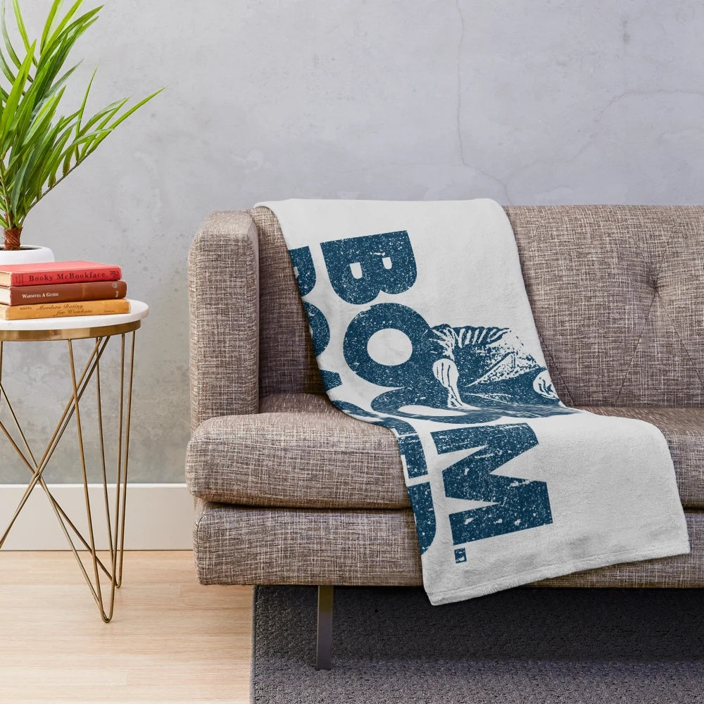 Plush blanket featuring a Michael Scott "Boom. Roasted." design inspired by the TV show The Office.