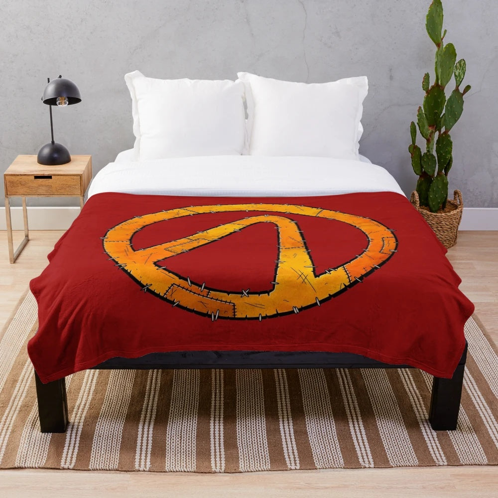 Borderlands-themed plush blanket with stitched vault symbol design