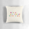 A pillow featuring the quote "We're all born naked and the rest is drag" from RuPaul's Drag Race