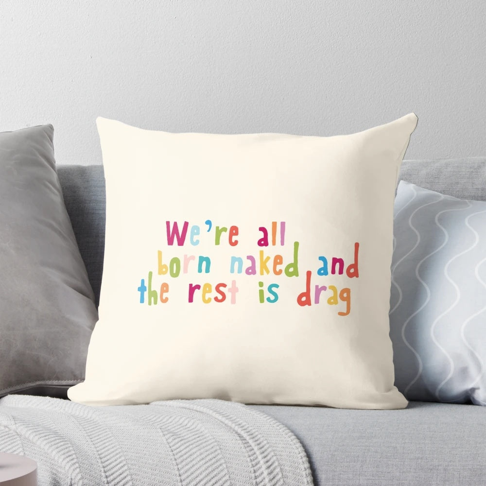 A pillow featuring the quote "We're all born naked and the rest is drag" from RuPaul's Drag Race
