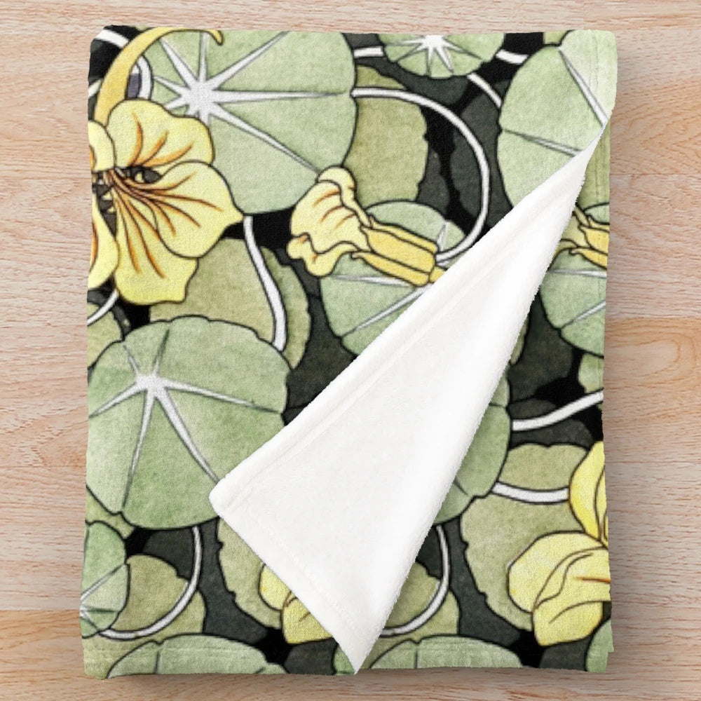 Plush blanket featuring an art nouveau floral pattern by Maurice Pillard Verneuil