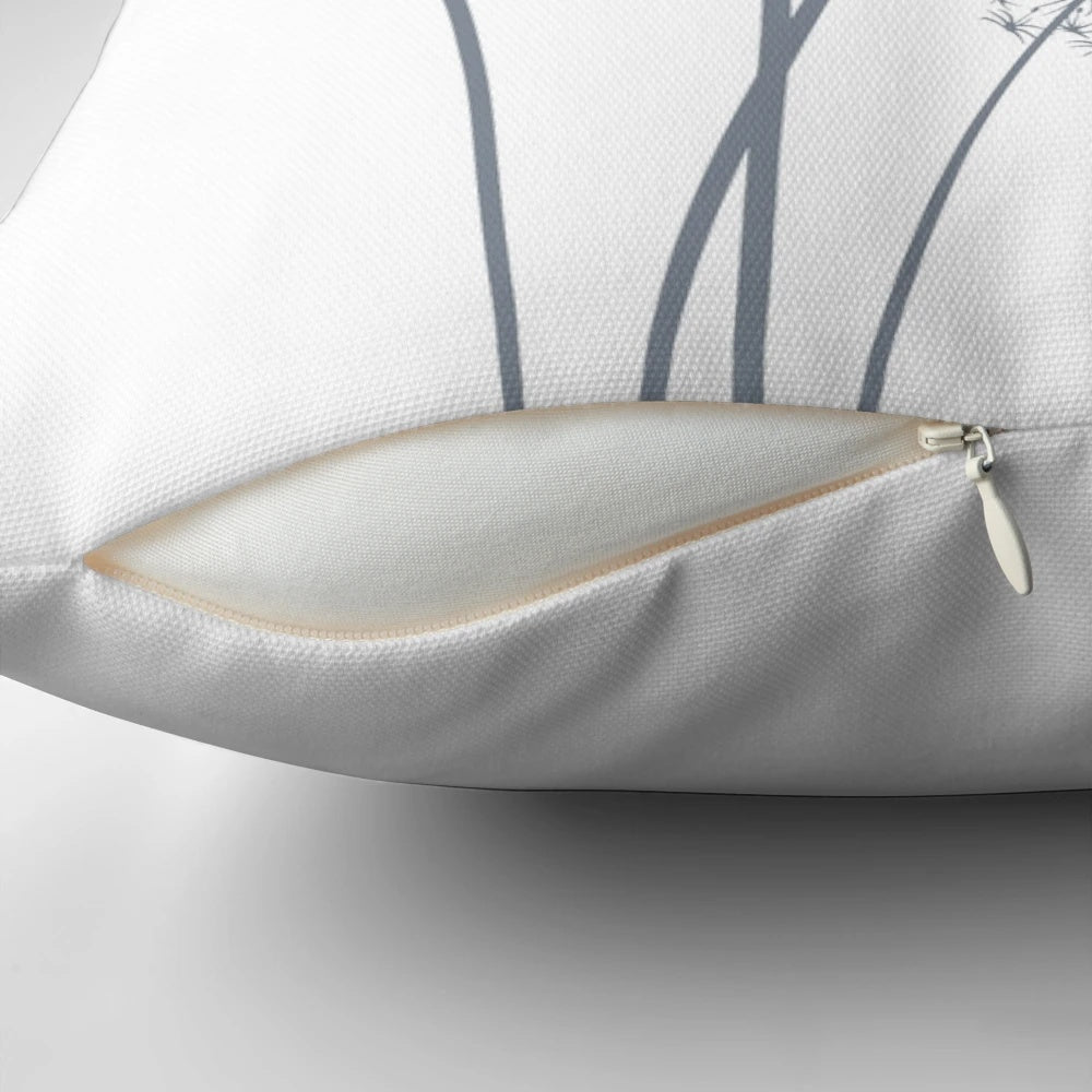 Soft, grey botanical dandelion accent pillow for indoor and outdoor use.