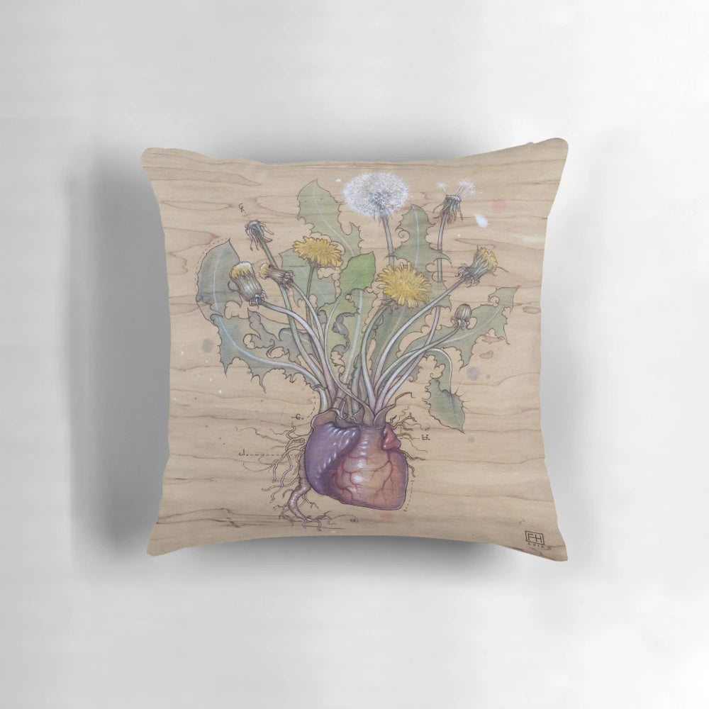 Decorative pillow with a detailed dandelion heart diagram design