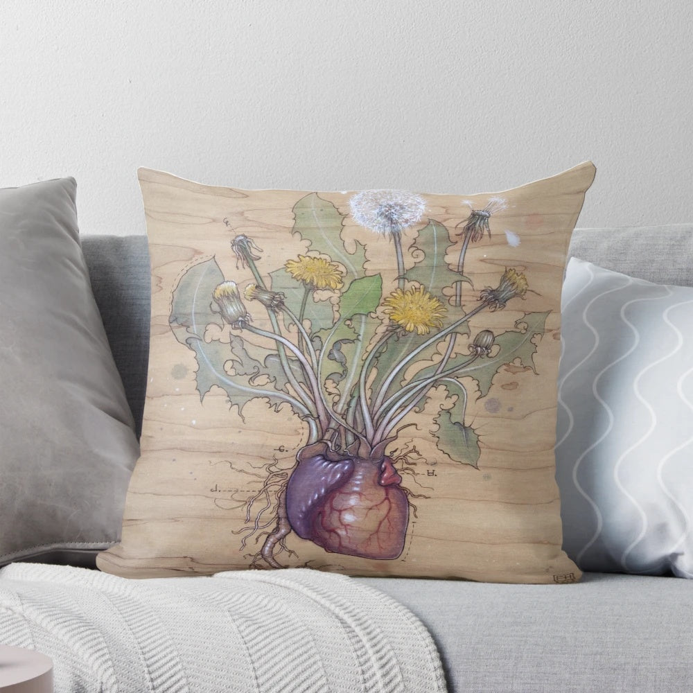 Decorative pillow with a detailed dandelion heart diagram design