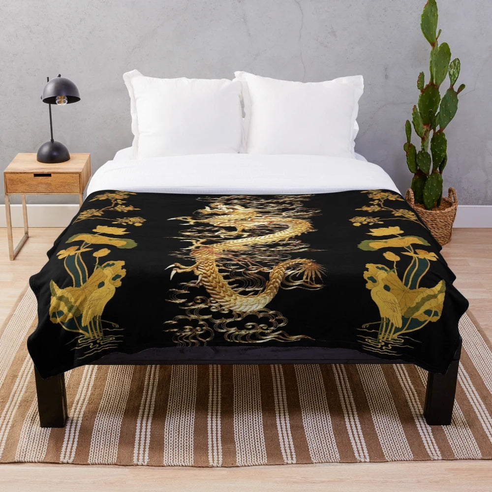 Plush blanket with digital illustration of a dragon, egret, lotus flowers, and green gold floral patterns