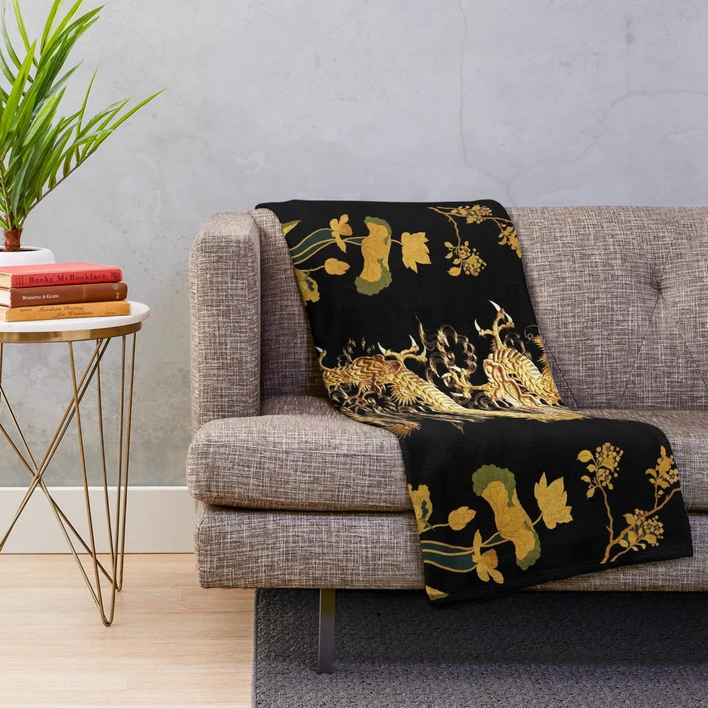 Plush blanket with digital illustration of a dragon, egret, lotus flowers, and green gold floral patterns