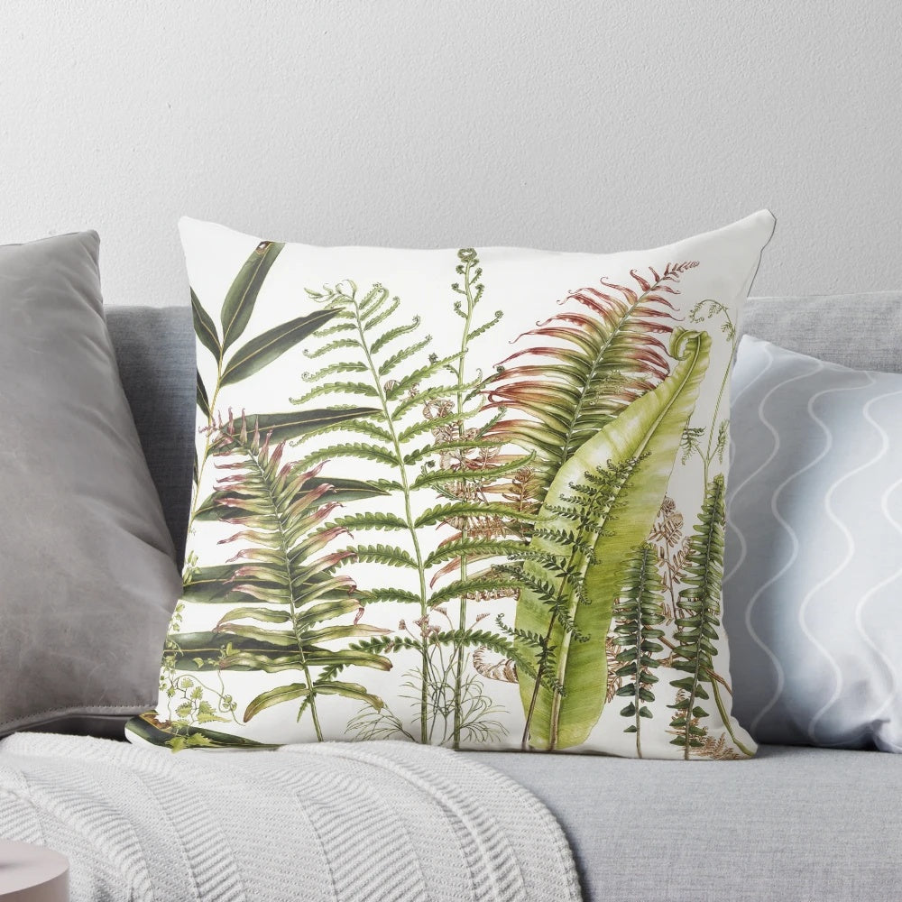 Vibrant watercolor painting of Australian ferns on a decorative throw pillow