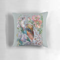 Vibrant floral peacock pattern on a soft, decorative throw pillow for the home.